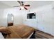 Bright bedroom featuring hardwood floors, ceiling fan and ensuite closet at 2114 Mount Vernon St, Orlando, FL 32803