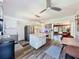 Bright kitchen with a large center island, dining area, and stainless steel refrigerator at 2114 Mount Vernon St, Orlando, FL 32803