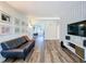Stylish living room featuring modern decor, hardwood floors, and ample natural light, great for entertaining at 2114 Mount Vernon St, Orlando, FL 32803