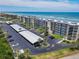 Beachfront condos with private balconies, covered parking, and lush landscaping at 3100 Ocean Shore Blvd # 4030, Ormond Beach, FL 32176