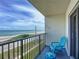 Condo balcony offers ocean views and space to relax at 3100 Ocean Shore Blvd # 4030, Ormond Beach, FL 32176