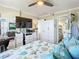 Cozy bedroom with a fun sea themed bedding, a desk area, and ensuite bathroom at 3100 Ocean Shore Blvd # 4030, Ormond Beach, FL 32176