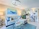 Bright living room featuring stylish decor, comfortable seating, and an open layout perfect for entertaining at 3100 Ocean Shore Blvd # 4030, Ormond Beach, FL 32176