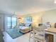 Inviting living room with balcony access and beautiful ocean views at 3100 Ocean Shore Blvd # 4030, Ormond Beach, FL 32176