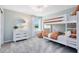 This bedroom includes bunkbeds, large window for natural light, and playful decor elements at 3156 Emerald Acres Ln, Sanford, FL 32771