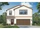 Charming two-story home with a two-car garage, brown accents, and stone accents at 3255 Cup Dr, Lakeland, FL 33803