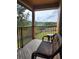 Relax on this balcony with a beautiful view of the green landscape at 3500 Calabria Ave, Davenport, FL 33897