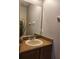 Bathroom featuring a vanity with granite countertops and a large mirror at 3500 Calabria Ave, Davenport, FL 33897