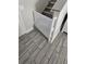 Safety gate installation at the bottom of the stairway enhances childproofing in the home at 3500 Calabria Ave, Davenport, FL 33897