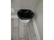 Picture of a bathroom trash can with black bag at 3500 Calabria Ave, Davenport, FL 33897