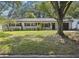Charming single-story home with a well-maintained lawn and mature trees in a desirable neighborhood at 3520 N Westmoreland Dr, Orlando, FL 32804