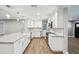Beautifully updated kitchen featuring custom cabinets, granite countertops and stainless appliances at 3520 N Westmoreland Dr, Orlando, FL 32804