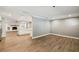 Open-concept layout seamlessly connects the living space to the kitchen and fireplace area at 3520 N Westmoreland Dr, Orlando, FL 32804