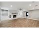 Inviting living room features a brick fireplace and built-in shelving for added charm at 3520 N Westmoreland Dr, Orlando, FL 32804