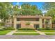 Inviting two-story condo with mature trees, manicured lawn, and visible parking at 419 Sheoah Blvd # 27, Winter Springs, FL 32708