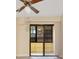 View of a patio from the inside with ceiling fan at 419 Sheoah Blvd # 27, Winter Springs, FL 32708