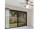 View from the living room to the patio with ceiling fan at 419 Sheoah Blvd # 27, Winter Springs, FL 32708