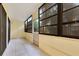 Bright sunroom featuring tiled floors and large windows, perfect for enjoying natural light and outdoor views at 419 Sheoah Blvd # 27, Winter Springs, FL 32708