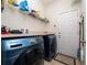 Bright laundry room with modern washer and dryer at 426 Citrus Isle Loop, Davenport, FL 33837