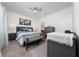 Spacious main bedroom with plush carpeting, ceiling fan and ensuite bathroom at 426 Citrus Isle Loop, Davenport, FL 33837