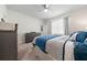 Main bedroom with plush carpeting and large window for natural light at 426 Citrus Isle Loop, Davenport, FL 33837