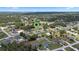 Aerial view of a residential area showcasing green landscapes and neighborhood layout at 4811 Sw 108Th Place Rd, Ocala, FL 34476