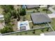 Aerial view of a home with private fenced yard, in-ground pool with gazebo at 4811 Sw 108Th Place Rd, Ocala, FL 34476