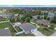 Inviting backyard featuring an in-ground pool and a cozy outdoor patio area at 4811 Sw 108Th Place Rd, Ocala, FL 34476
