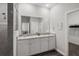 This bathroom features vanity with double sinks, granite countertops and shower at 4811 Sw 108Th Place Rd, Ocala, FL 34476
