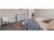 Bedroom boasts decorative pillows, a wooden dresser and a comfortable chair at 4811 Sw 108Th Place Rd, Ocala, FL 34476