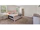 Spacious bedroom features two large windows and a bed with decorative pillows at 4811 Sw 108Th Place Rd, Ocala, FL 34476