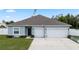 Charming single-story home with a two-car garage and well-maintained lawn at 4811 Sw 108Th Place Rd, Ocala, FL 34476