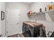 Functional laundry area with a modern washer and dryer set and convenient overhead shelving at 4811 Sw 108Th Place Rd, Ocala, FL 34476