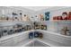 Walk-in pantry with shelving and organized storage at 4811 Sw 108Th Place Rd, Ocala, FL 34476