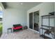 Inviting outdoor seating on a patio with pavers and modern furniture for relaxing at 4811 Sw 108Th Place Rd, Ocala, FL 34476