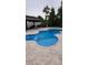 Beautiful pool with a spa and plenty of space for entertaining guests in the backyard at 4811 Sw 108Th Place Rd, Ocala, FL 34476