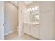 Bright bathroom with vanity, cabinet storage, and updated lighting at 5215 Nw 34Th St, Ocala, FL 34482