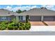 Charming home featuring a two-car garage and beautifully landscaped front yard at 5215 Nw 34Th St, Ocala, FL 34482