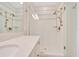 Close-up of a tiled walk-in shower with a glass door, double shower heads, and modern fixtures at 5215 Nw 34Th St, Ocala, FL 34482