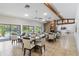 Spacious clubhouse with fireplace and views of the pool and lake provides elegant space for gatherings at 6 Escondido Cir # 55, Altamonte Springs, FL 32701