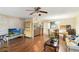 Open living space with hardwood floors and dining area at 6 Escondido Cir # 55, Altamonte Springs, FL 32701