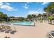 Large community pool with lots of space and chairs for sunning, overlooks the community and lake at 6 Escondido Cir # 55, Altamonte Springs, FL 32701