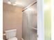Tiled shower with glass door and updated fixtures in well-lit bathroom at 6 Escondido Cir # 55, Altamonte Springs, FL 32701