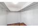 Walk-in closet with shelves and hanging rods for organization and storage at 6 Escondido Cir # 55, Altamonte Springs, FL 32701
