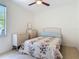 Bright bedroom with vintage dressers and a window with views of the outside at 600 Garden Club Dr, Deland, FL 32724