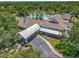 An aerial shot showcases the clubhouse and community pool, offering a glimpse of recreational amenities at 600 Garden Club Dr, Deland, FL 32724