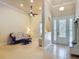 Open concept living room with high ceilings, neutral paint and tiled floors at 600 Garden Club Dr, Deland, FL 32724