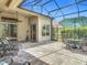Spacious screened lanai with brick pavers, room for seating and ceiling fan at 600 Garden Club Dr, Deland, FL 32724