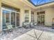 Spacious screened lanai with brick pavers, and comfortable seating at 600 Garden Club Dr, Deland, FL 32724