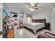 Spacious bedroom featuring tile floors, a cozy bed, and ample storage, perfect for relaxation and rest at 6017 Brookhill Ct, Orlando, FL 32810